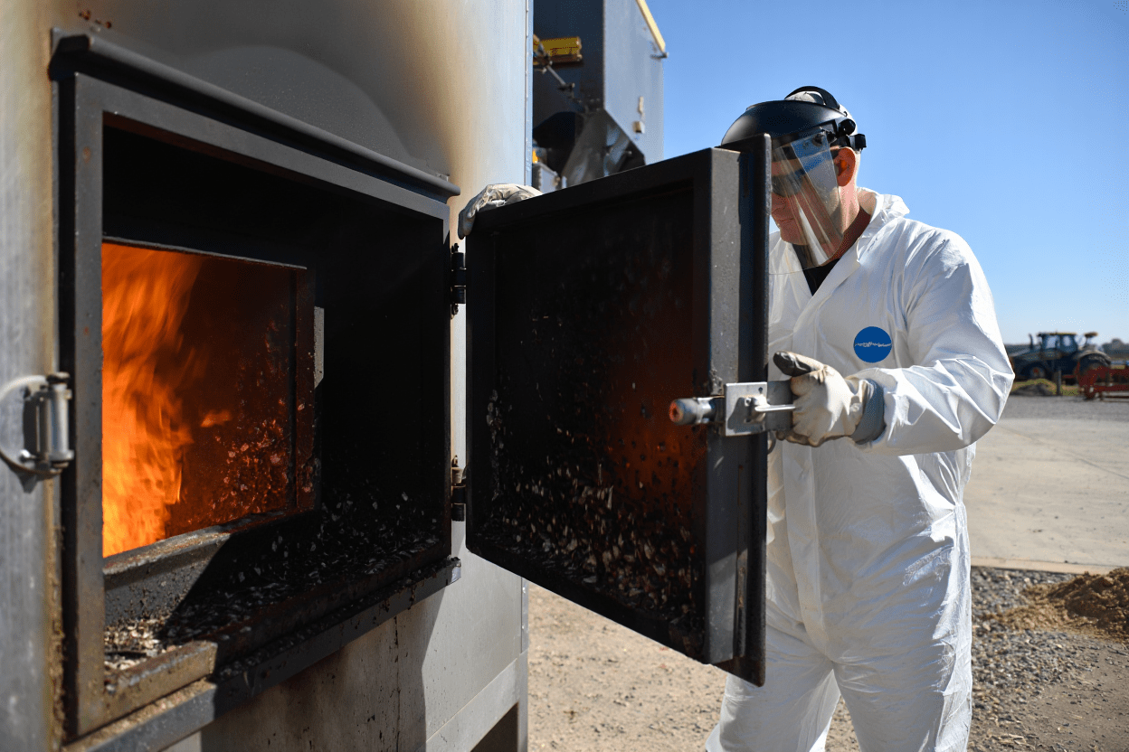 Industrial incinerator loading door for waste processing equipment