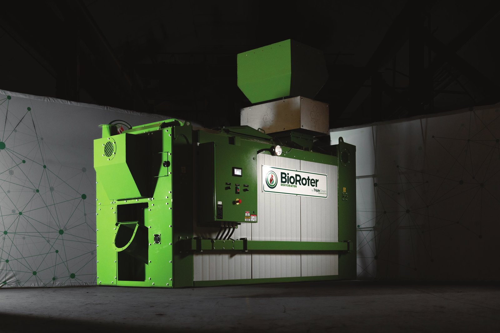 BioRoter dehydrator unit with loading hopper installed in an industrial building